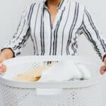 Woman holding a laundry basket